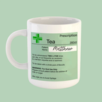 White mug with a green prescription label on a light green background