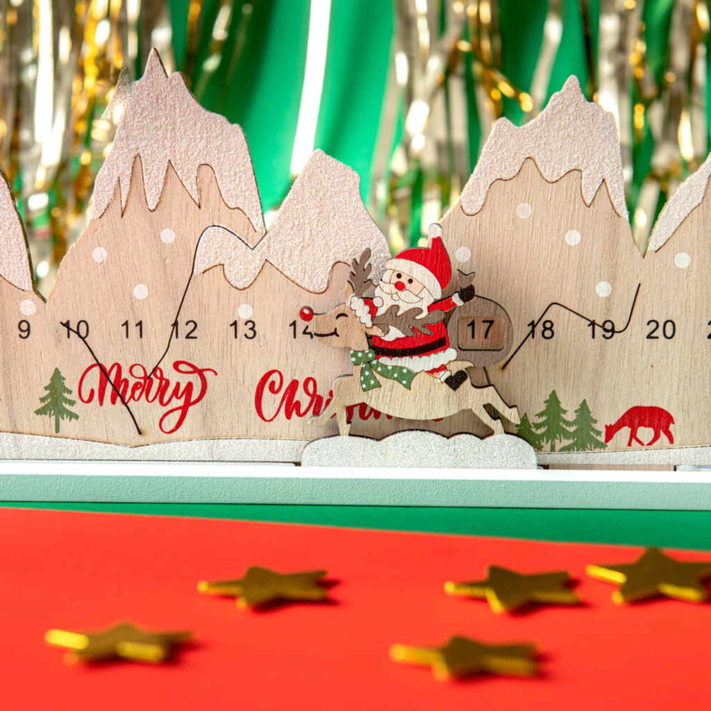 Personalised wooden Santa riding a reindeer on a Christmas countdown calendar