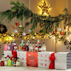 Giant Gin Filled Advent Cracker with 24 days of gin arranged on a festive floor