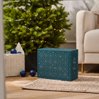 Wine Down To Christmas 24-day wine advent calendar displayed beside a decorated Christmas tree