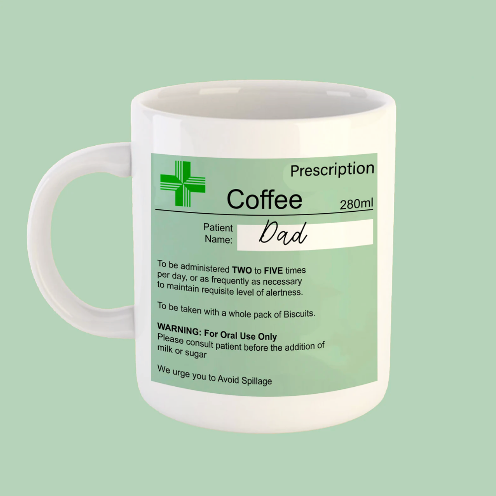 White mug with a green prescription label on a light green background