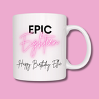 White mug with 'EPIC Eighteen Happy Birthday Ellie' text on a pink background