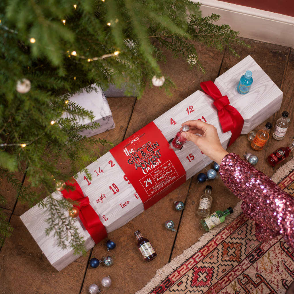 Giant Gin Filled Advent Cracker product image showing the 24-day gin calendar and miniature bottles