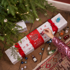 Giant Gin Filled Advent Cracker product image showing the 24-day gin calendar and miniature bottles