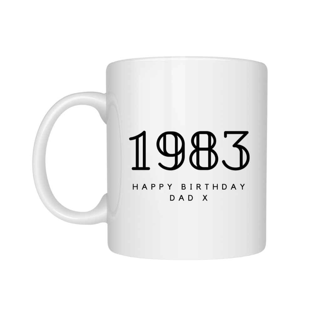 White mug with '1983 Happy Birthday Dad X' text on a white background