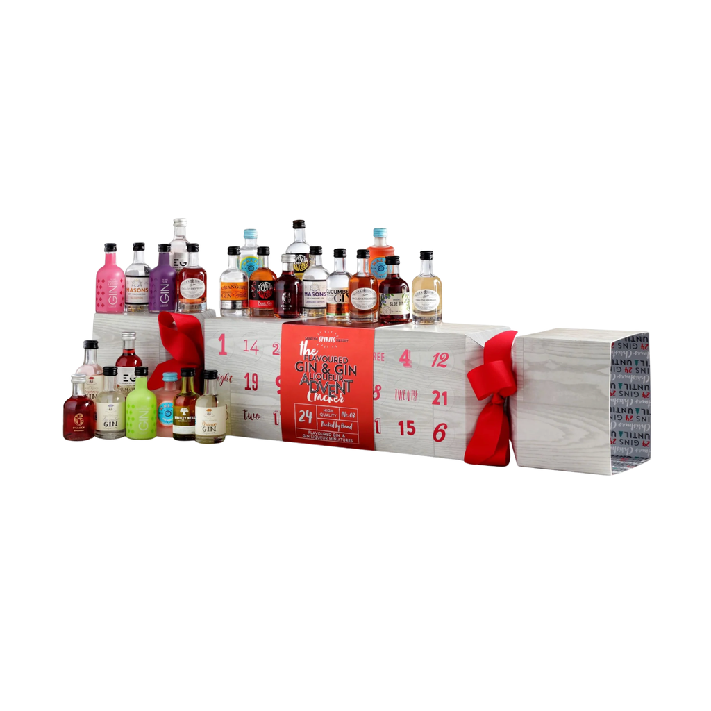 Giant Gin Filled Advent Cracker being opened with a miniature gin during the Christmas countdown