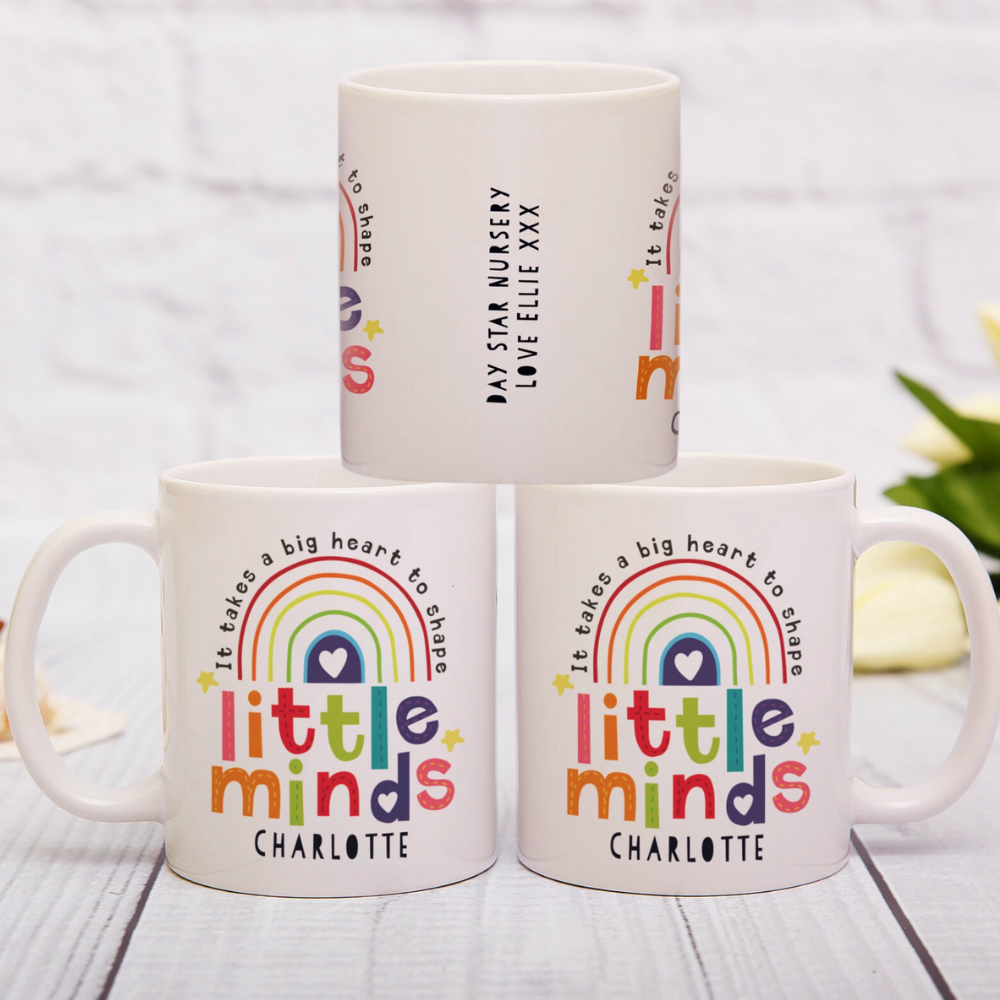 Personalised Little Minds teacher mug product shot on white surface showing Mrs Jones name with rainbow and stars design