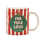 Mug with red and white striped pattern and green ornament graphic with text 'FAB YULE LOUS Charlotte'.