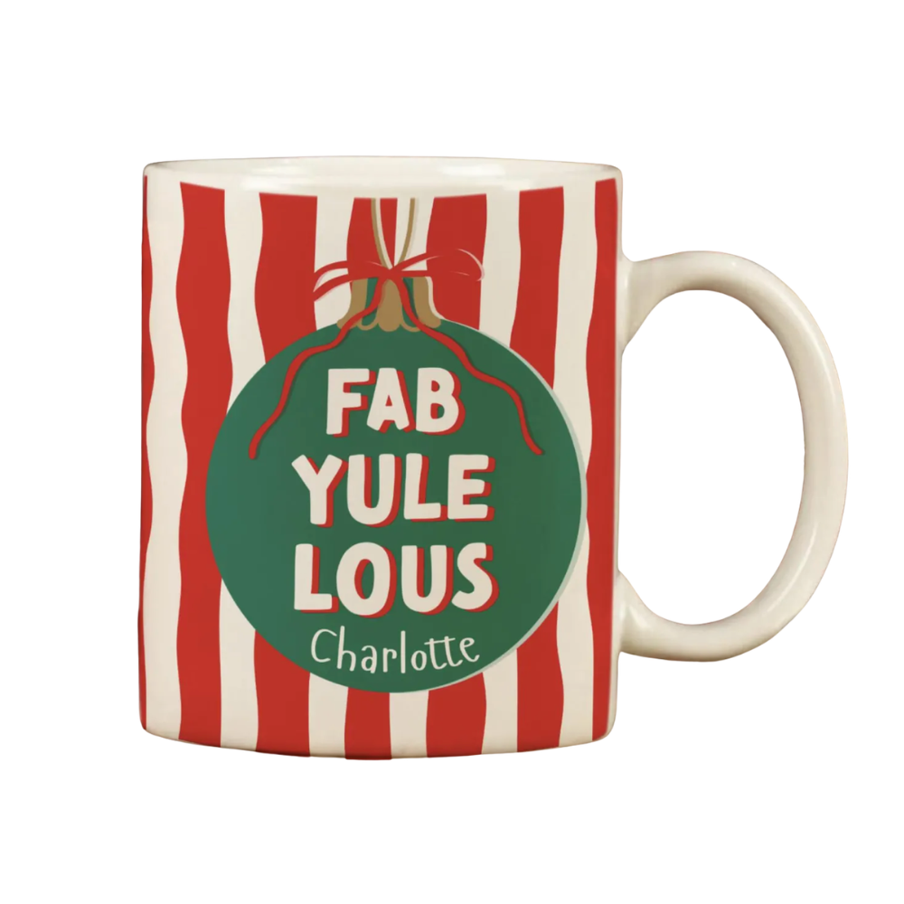 Mug with red and white striped pattern and green ornament graphic with text 'FAB YULE LOUS Charlotte'.