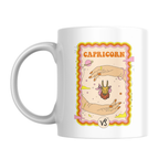 White mug with Capricorn zodiac design on a white background