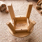Underside of Personalised Wooden Stool showing secret message May love health and happiness be yours always laser engraved on the base