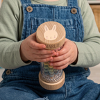 Wooden bunny rainmaker sensory toy with bunny design and pastel beads