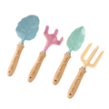 Four wooden-handled gardening tools on a white background: a blue leaf-shaped trowel, a pink leaf-shaped weeder, a mint green leaf-shaped transplanting fork, and a natural wood three-prong garden fork. Each handle is engraved with 'Lola's Pretty Tools'.