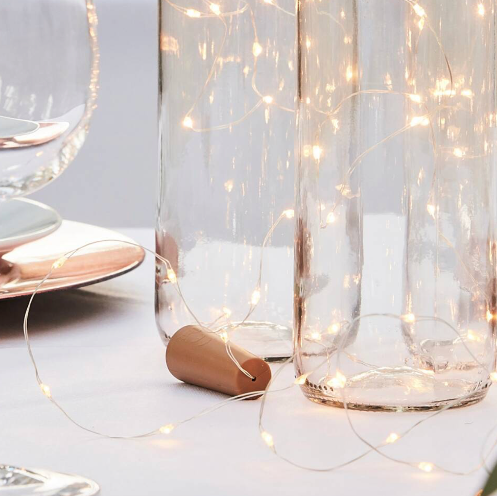 Rose Gold LED String Lights on a Cork