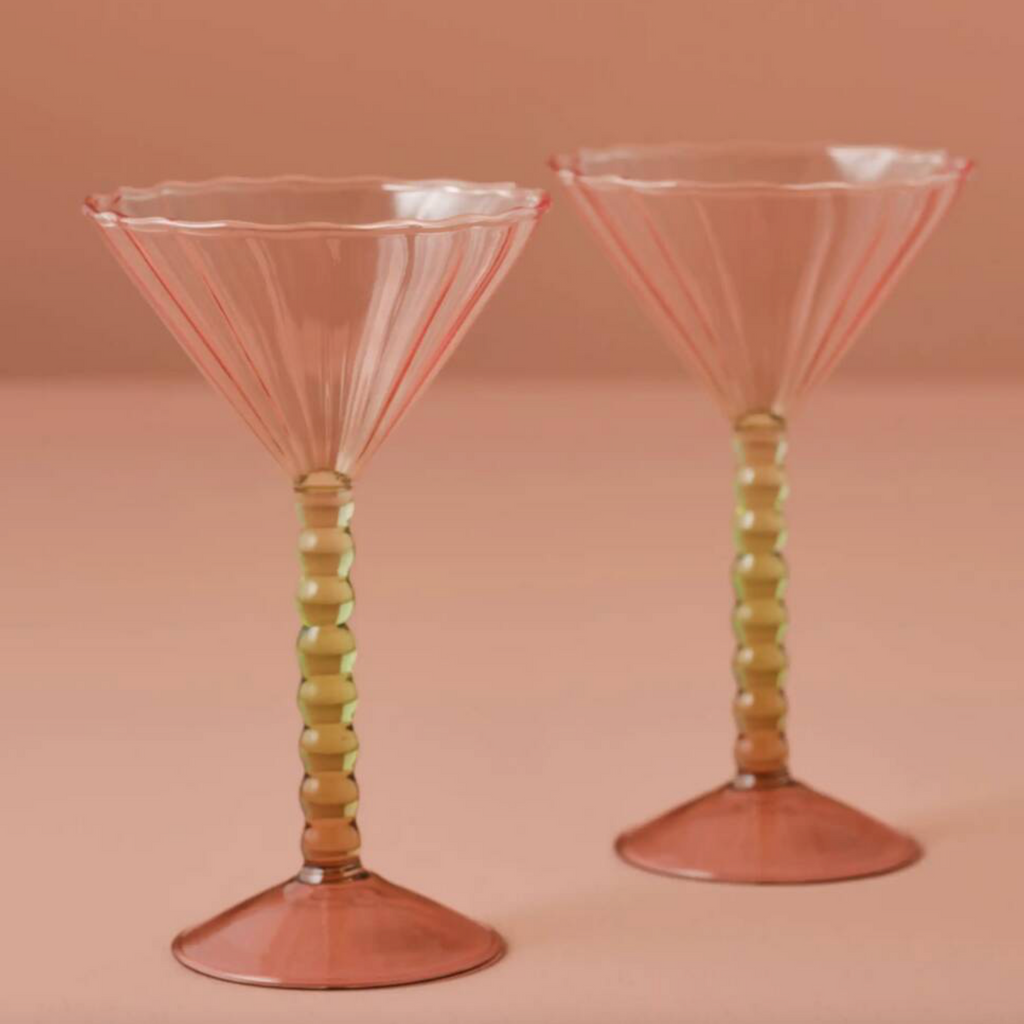 A Pair Of Pink And Green Coupe Cocktail Glasses