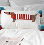 Embroidered Sausage Dog Cushion with Pom Poms