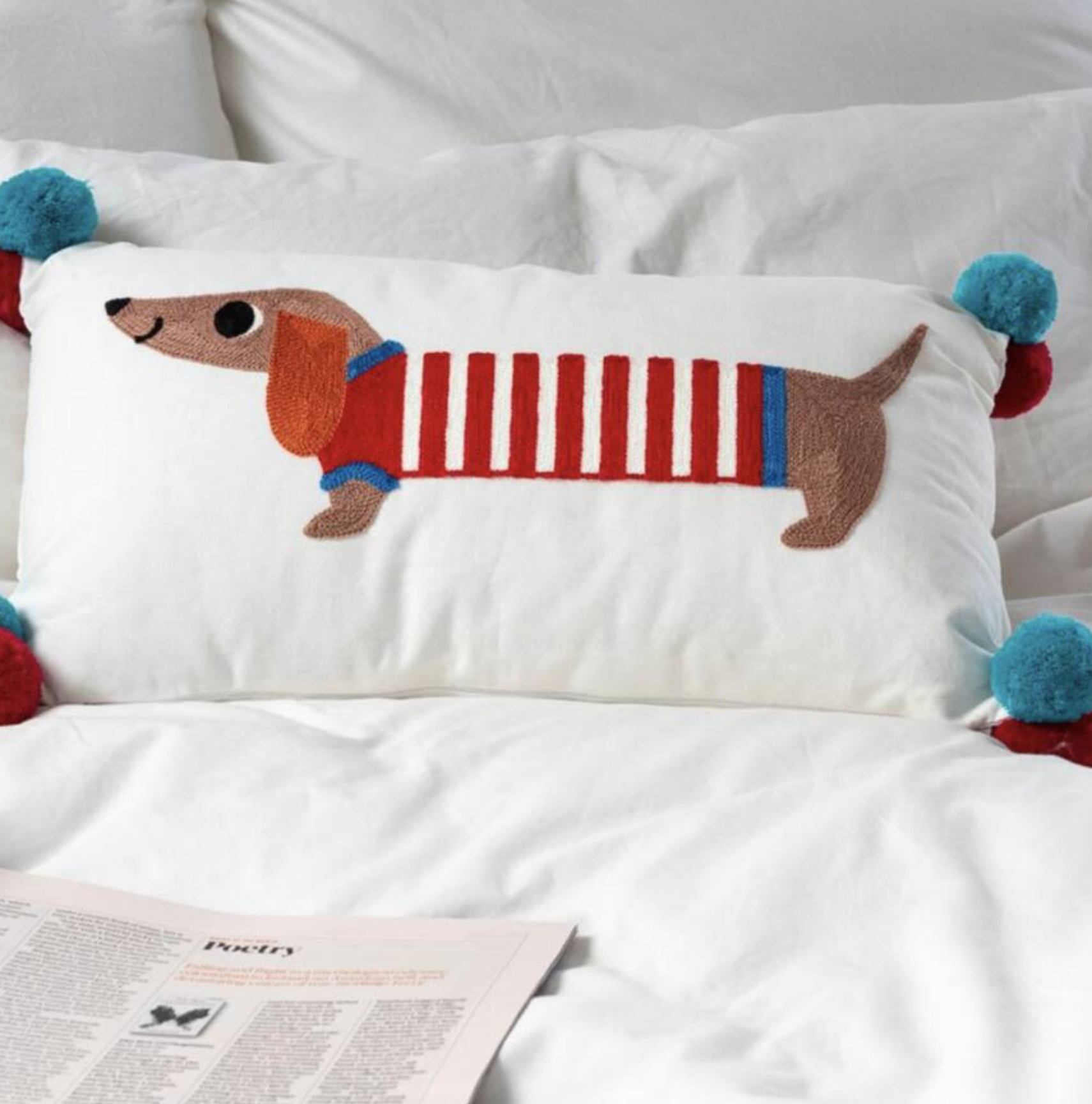 Embroidered Sausage Dog Cushion with Pom Poms