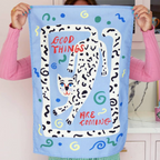 Good Things Are Coming Tea Towel on pink background showing the full design and colours