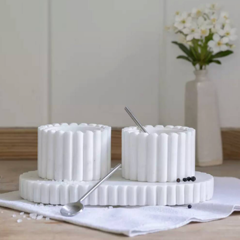 Marble Pinch Pots With Tray styled on a white linen cloth on a wooden table with white flowers in background