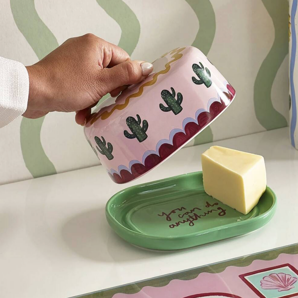 Pink And Green Cactus Design Butter Dish open on a light blue background showing the full design and green dish