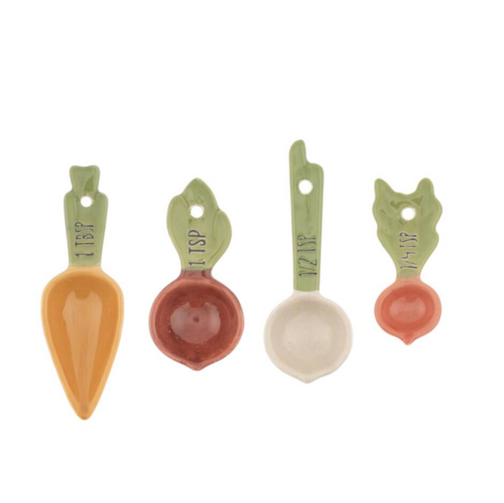 Ceramic Vegetable Patch Measuring Spoons stored in the Veg Patch ceramic crate on a white wooden surface