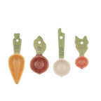 Ceramic Vegetable Patch Measuring Spoons stored in the Veg Patch ceramic crate on a white wooden surface