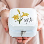 Personalised Birth Flower Jewellery Case with daisy April birth flower and name Esme held in two hands