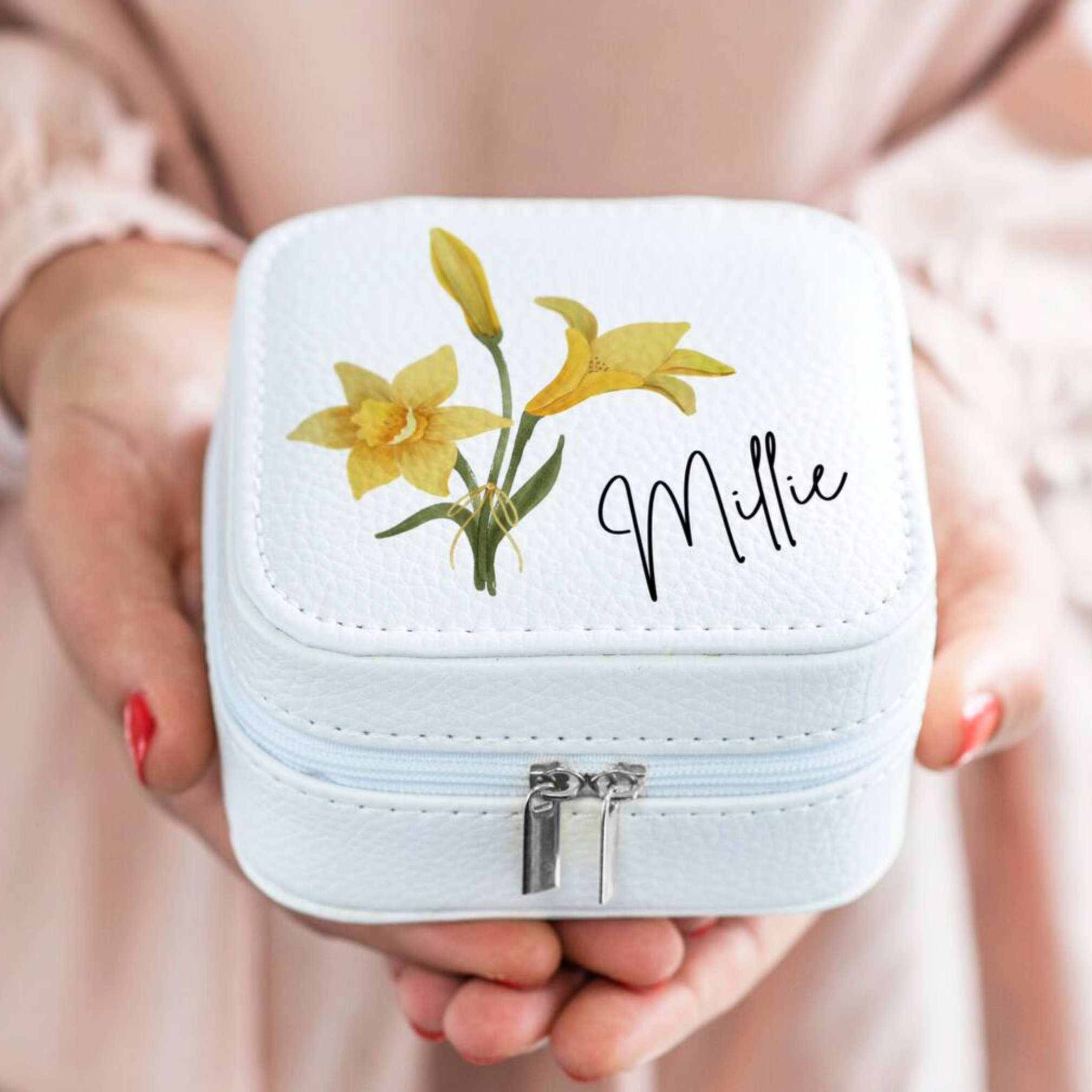 Personalised Birth Flower Jewellery Case with daisy April birth flower and name Esme held in two hands