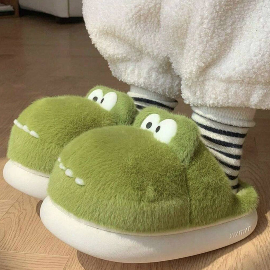 Green 3D monster slippers with eyes, teeth and white soles