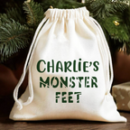 Personalised cotton gift bag printed with Monster Feet for green slippers