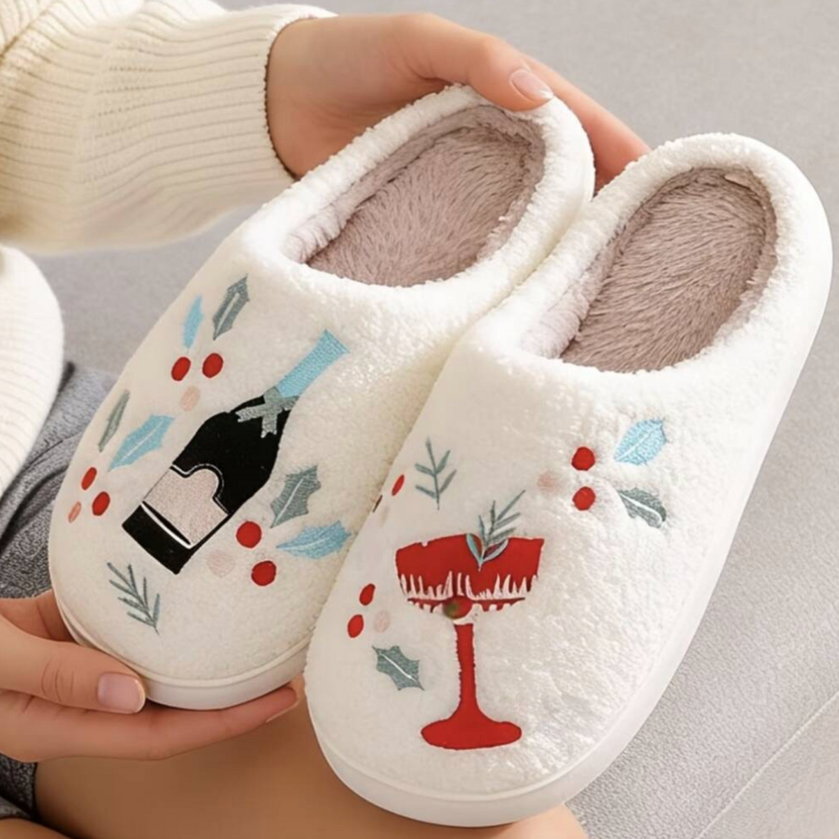 Pair of white Champagne Cocktail O’Clock slippers with bottle and cocktail glass designs