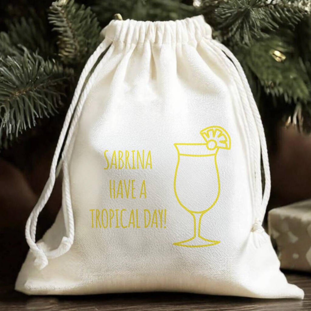 Personalised cotton gift bag with a tropical Pina Colada message and cocktail illustration