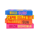 A set of colorful French Riviera travel book spines and matching stackable book covers on a white background. Visible titles include Mykonos Muse, Palm Beach, St.