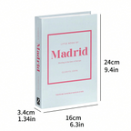 Decorative city faux book showing dimensions of 24 centimetres high, 16 centimetres wide and 3.4 centimetres deep