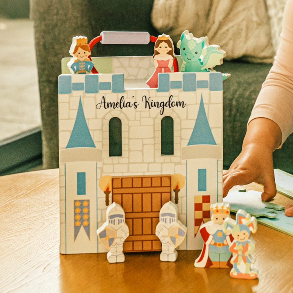 Wooden castle play set with moat, knights, princess and king characters