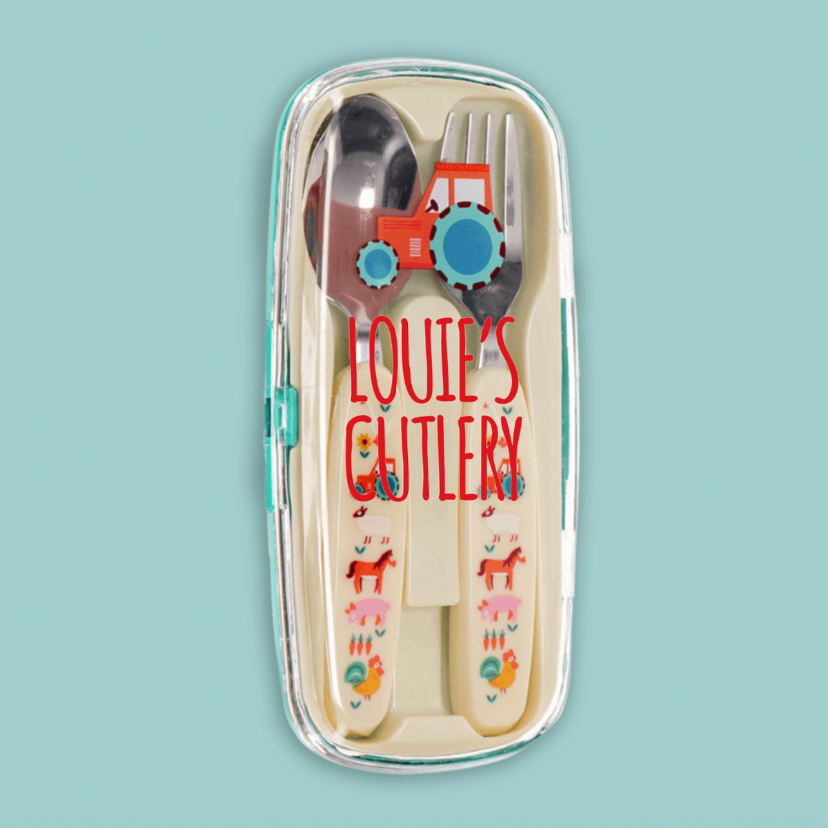A personalized children's stainless steel cutlery set inside a clear plastic case, featuring a red tractor and the name 'LOUIE'S GUTLERY' printed on the cream-colored handles, set against a solid light blue background.
