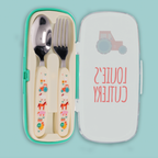 A children's cutlery set in a mint green plastic case, shown open with a spoon and fork inside. The handles are cream with colorful cartoon animal prints, and the lid is white with a pink tractor illustration and the words 'LOUIE'S CUTLERY' in pink.