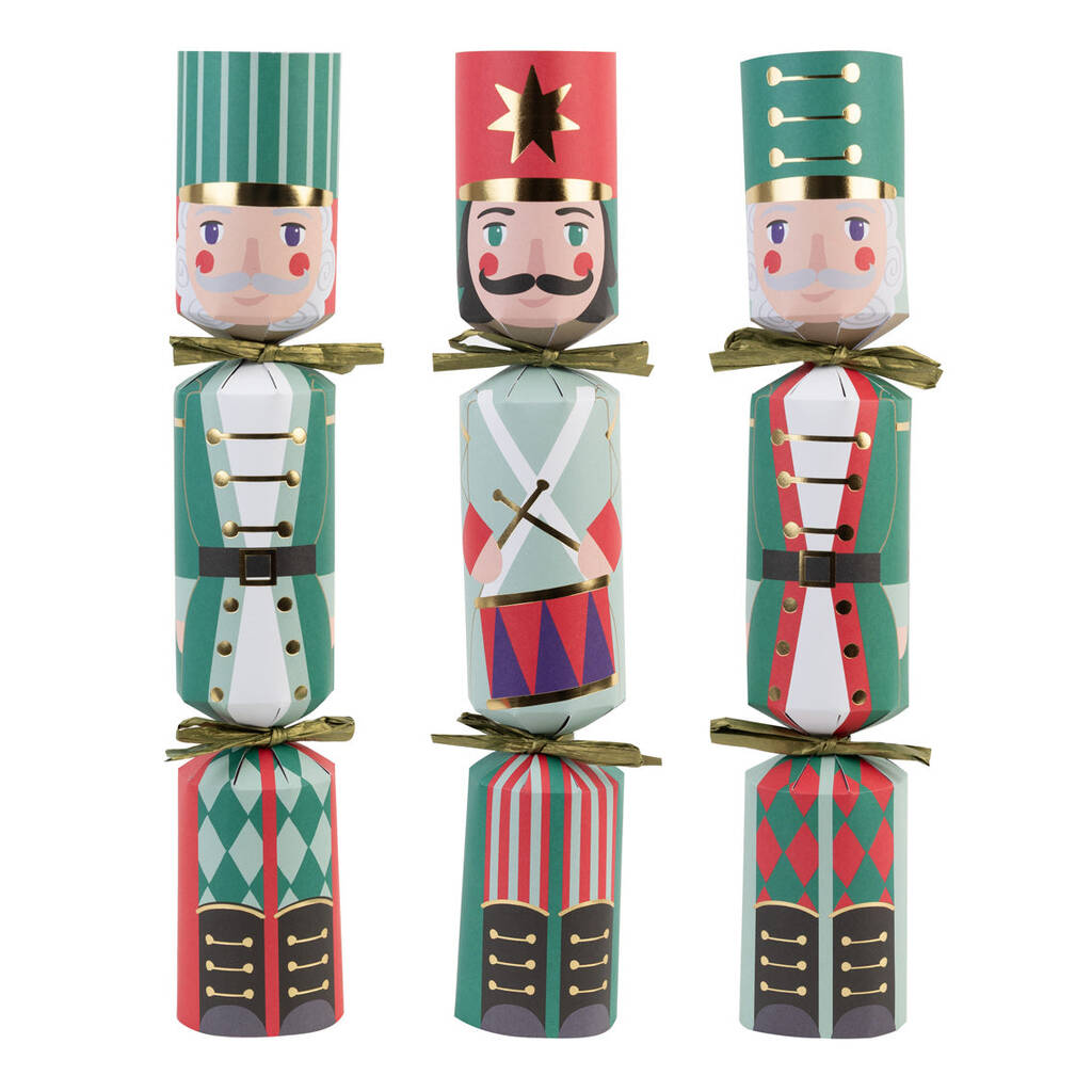 Set of four colorful nutcracker crackers on a white background